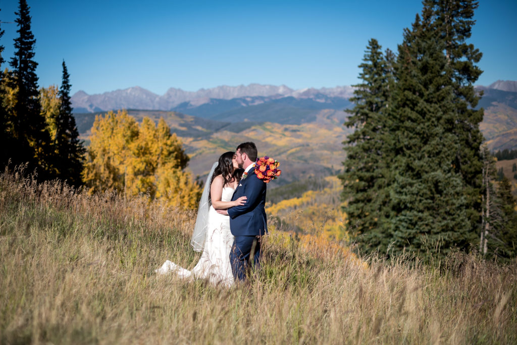 Bride and groom on a sunny fall day at the top of Beaver Creek Ski Resort