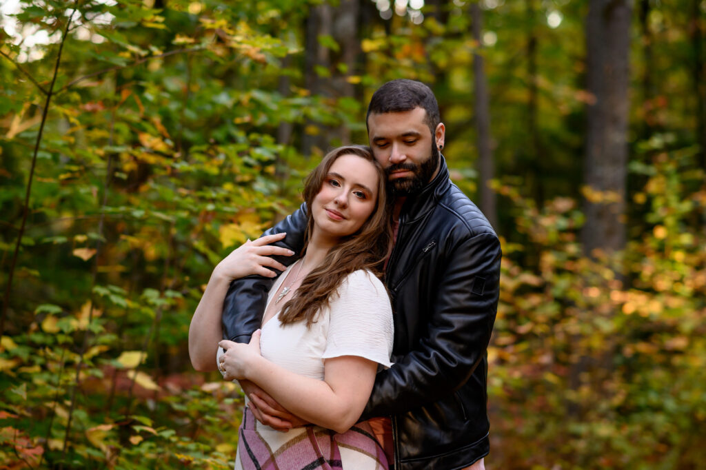 Soft moment between couple during their Sunapee engagement session