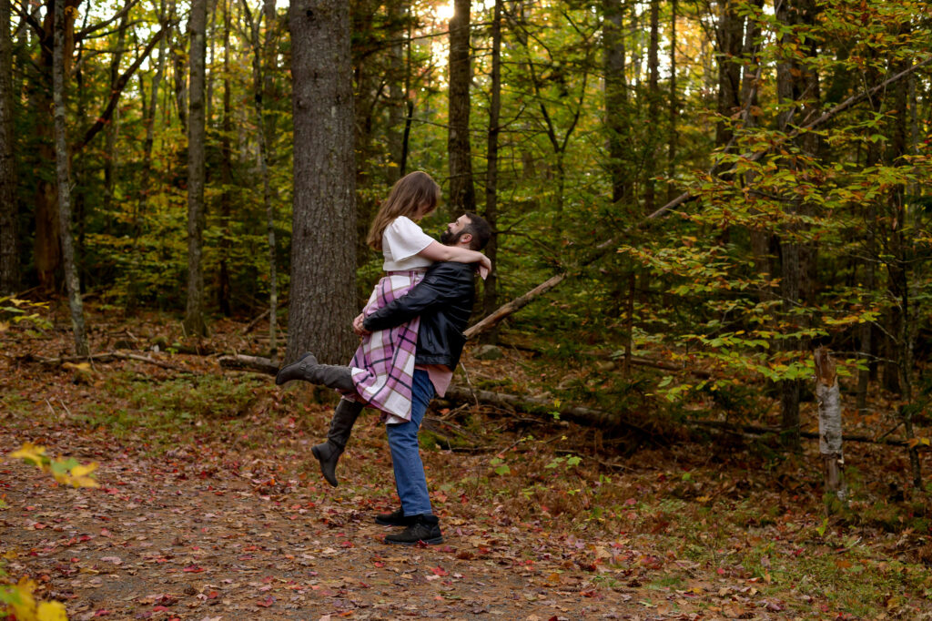 Couple facing eachother in a classic life in the forest of Sunapee