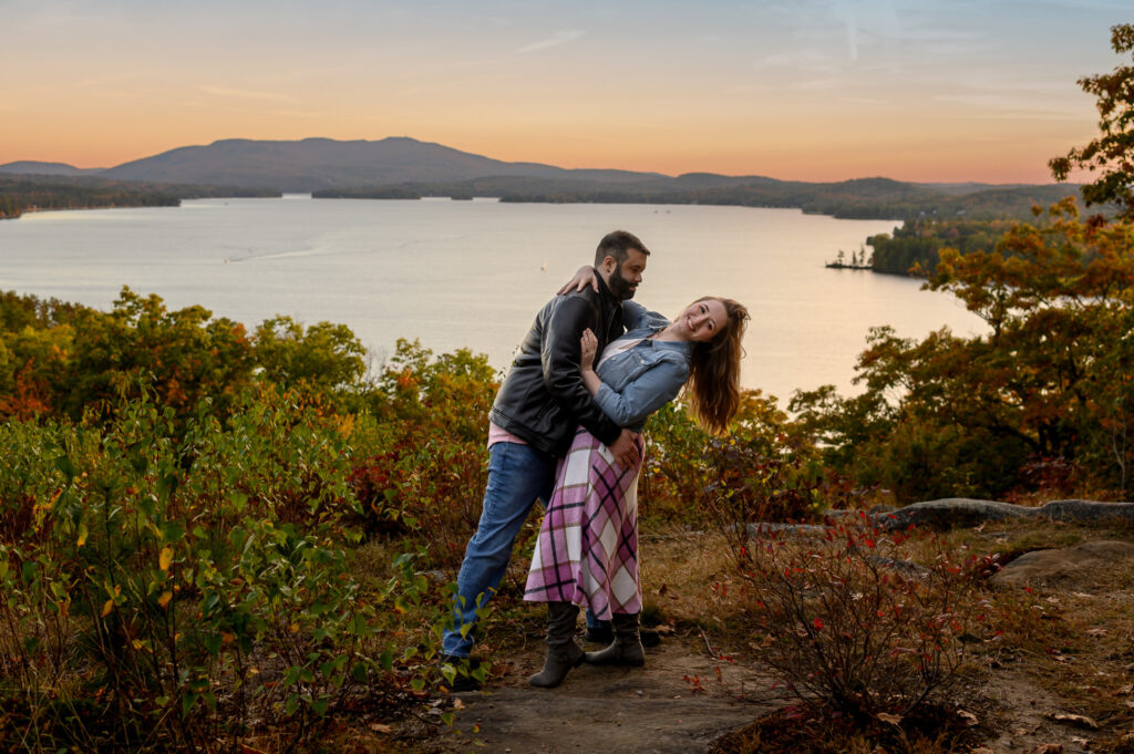 Sunset light over Lake Sunapee during fall engagement session